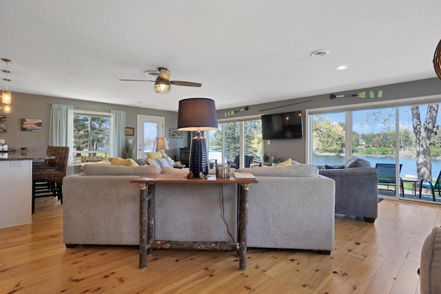 1014 Long Bow Ct, Nekoosa, WI 54457 - living area with light wood-style flooring, plenty of natural light, ceiling fan, and recessed lighting