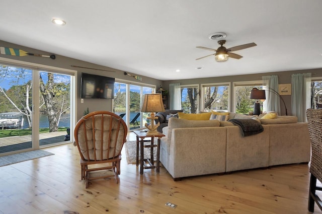 1014 Long Bow Ct, Nekoosa, WI 54457 - living room featuring a ceiling fan, light wood-type flooring, and recessed lighting