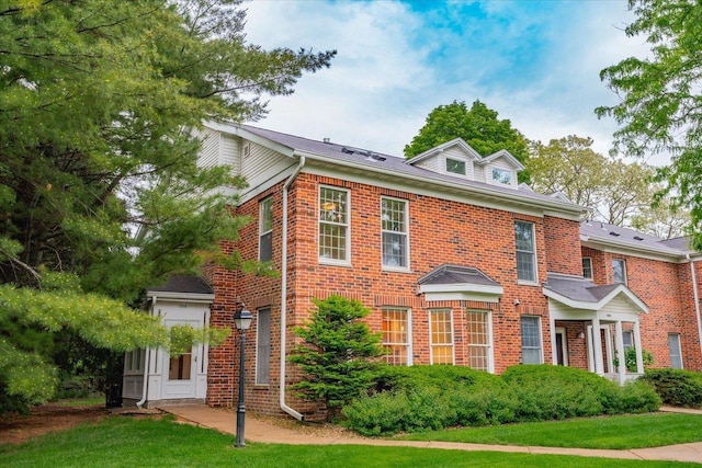 2818 Marshall Ct, Madison, WI 53705 - colonial inspired home with brick siding and a front lawn