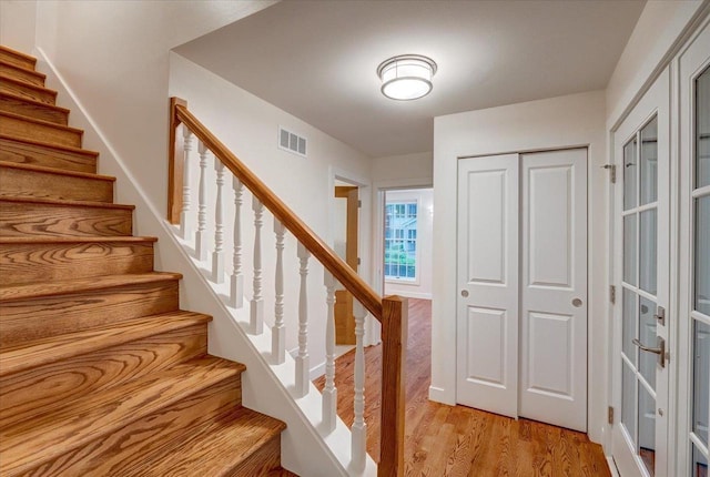 2818 Marshall Ct, Madison, WI 53705 - staircase featuring wood finished floors