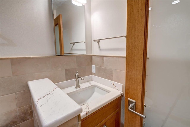 2818 Marshall Ct, Madison, WI 53705 - bathroom with vanity and tile walls