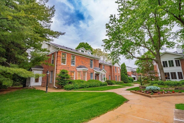 2818 Marshall Ct, Madison, WI 53705 - view of front of home with a front lawn and brick siding