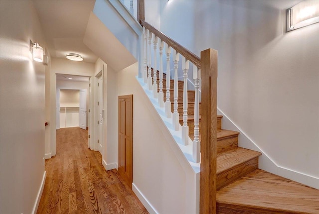 2818 Marshall Ct, Madison, WI 53705 - staircase featuring wood finished floors and baseboards