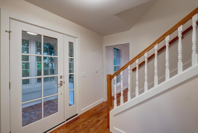 2818 Marshall Ct, Madison, WI 53705 - doorway with wood finished floors, baseboards, and stairway