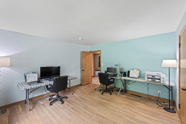 519 S Charles St, Waukesha, WI 53186 - home office with wood finished floors and baseboards