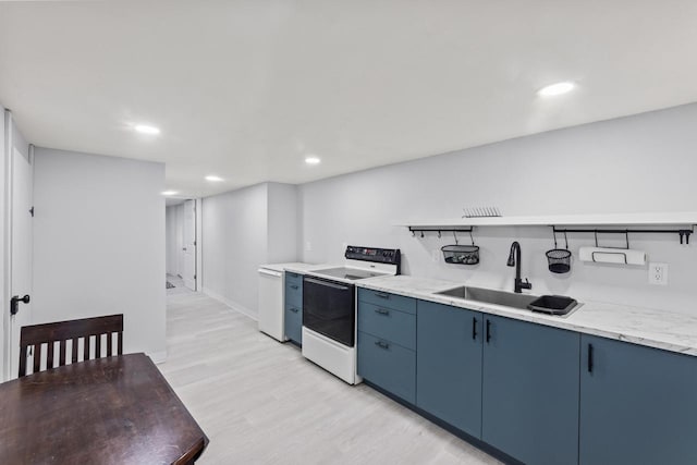 519 S Charles St, Waukesha, WI 53186 - kitchen with electric range oven, a sink, blue cabinets, open shelves, and light wood-type flooring