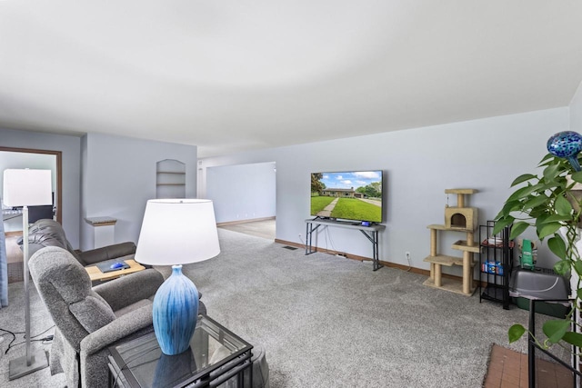 519 S Charles St, Waukesha, WI 53186 - carpeted living room featuring baseboards