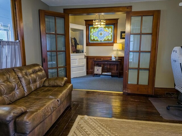 318 E Mary St, Darlington, WI 53530 - living area featuring hardwood / wood-style flooring and a chandelier