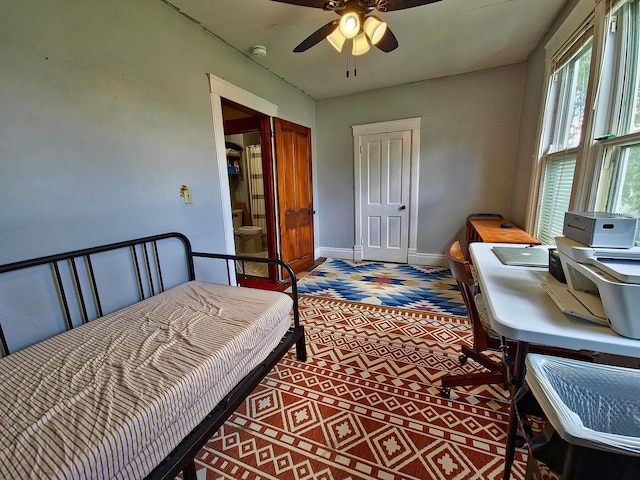 318 E Mary St, Darlington, WI 53530 - bedroom featuring baseboards, ceiling fan, and carpet