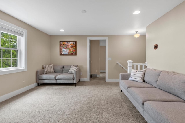 3155 W Lake Helen Dr, Rosholt, WI 54473 - living room featuring light carpet, baseboards, and recessed lighting