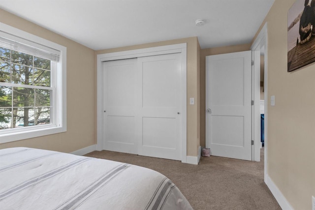 3155 W Lake Helen Dr, Rosholt, WI 54473 - carpeted bedroom with baseboards and a closet