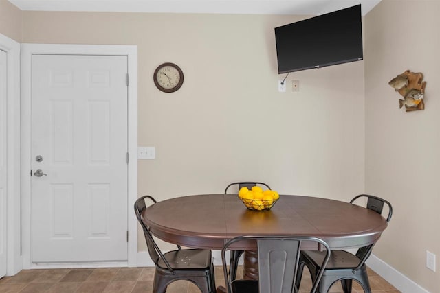 3155 W Lake Helen Dr, Rosholt, WI 54473 - dining area with baseboards