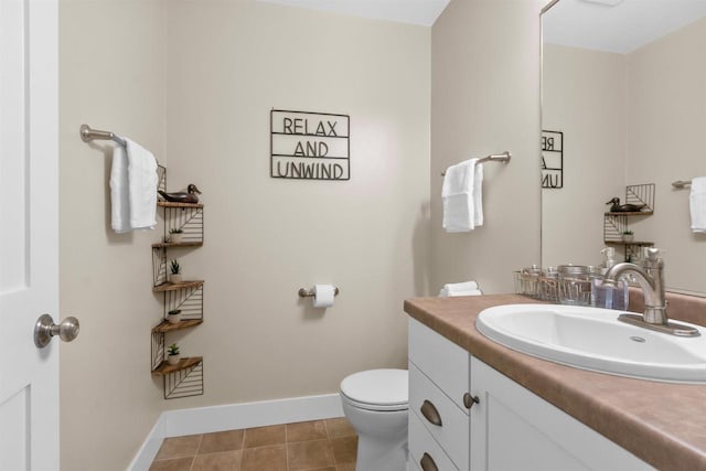 3155 W Lake Helen Dr, Rosholt, WI 54473 - bathroom with vanity, toilet, and baseboards