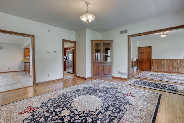 W1041 County Road O, Oconomowoc, WI 53066 - foyer with light wood finished floors and baseboards