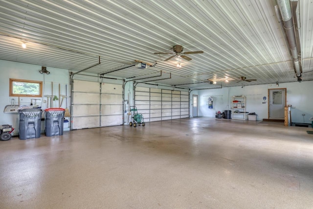 W1041 County Road O, Oconomowoc, WI 53066 - garage with ceiling fan and a garage door opener