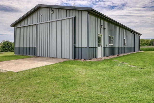 W1041 County Road O, Oconomowoc, WI 53066 - view of pole building featuring a lawn