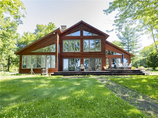 18845 64th Ave, Chippewa Falls, WI 54729 - back of house with a yard and a wooden deck