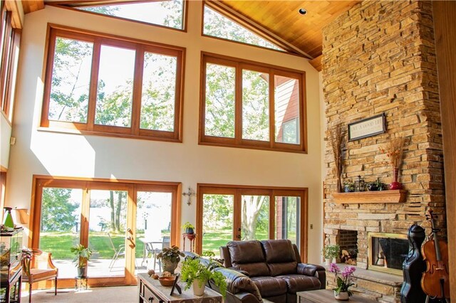 18845 64th Ave, Chippewa Falls, WI 54729 - living room with high vaulted ceiling, wood ceiling, and a stone fireplace