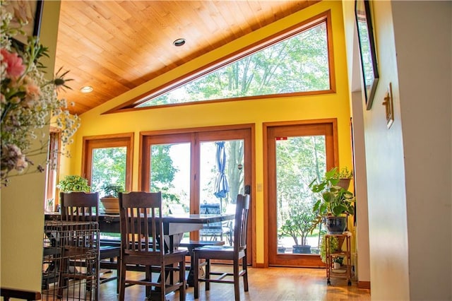 18845 64th Ave, Chippewa Falls, WI 54729 - dining area with wooden ceiling with exposed beams, wood finished floors, high vaulted ceiling, french doors, and recessed lighting