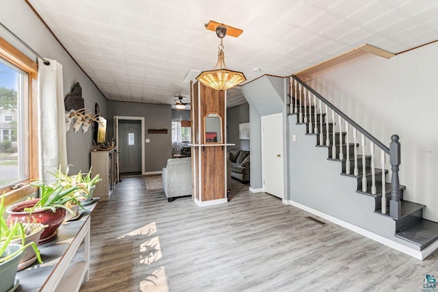 708 2nd Ave W, Ashland, WI 54806 - interior space with stairs, wood finished floors, and baseboards