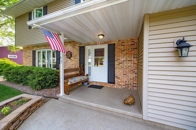 417 Raintree Dr, Fort Atkinson, WI 53538 - view of exterior entry with brick siding