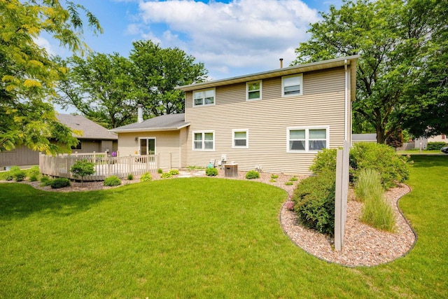 417 Raintree Dr, Fort Atkinson, WI 53538 - back of property with a lawn