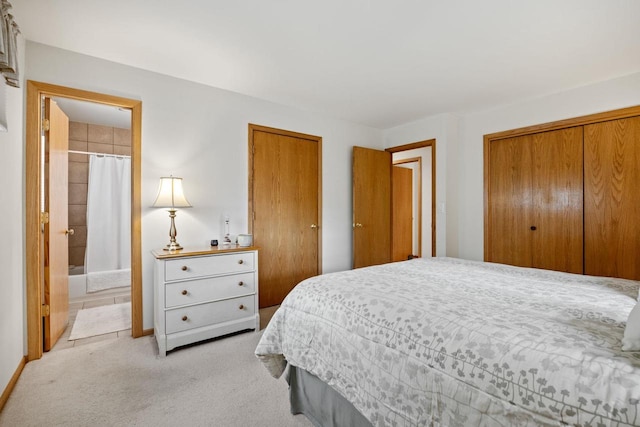 417 Raintree Dr, Fort Atkinson, WI 53538 - bedroom featuring light carpet and ensuite bath