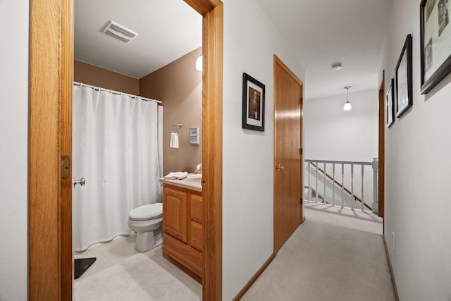 417 Raintree Dr, Fort Atkinson, WI 53538 - hall featuring an upstairs landing