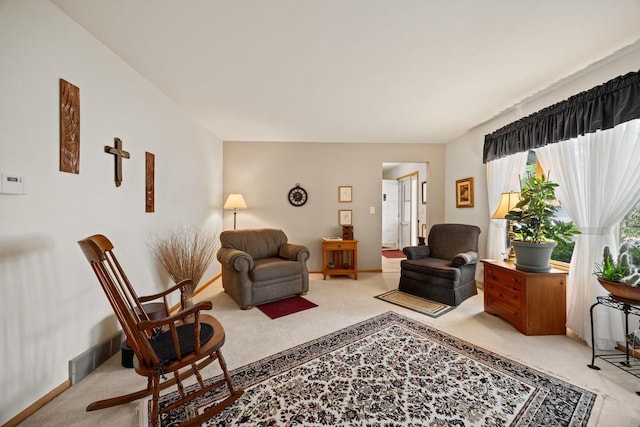 417 Raintree Dr, Fort Atkinson, WI 53538 - living area featuring light colored carpet and baseboards