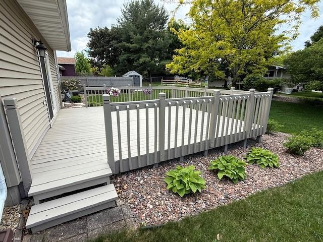 417 Raintree Dr, Fort Atkinson, WI 53538 - deck featuring a storage shed