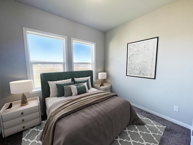 620 E Maple Beach Dr, Edgerton, WI 53534 - carpeted bedroom with multiple windows and baseboards