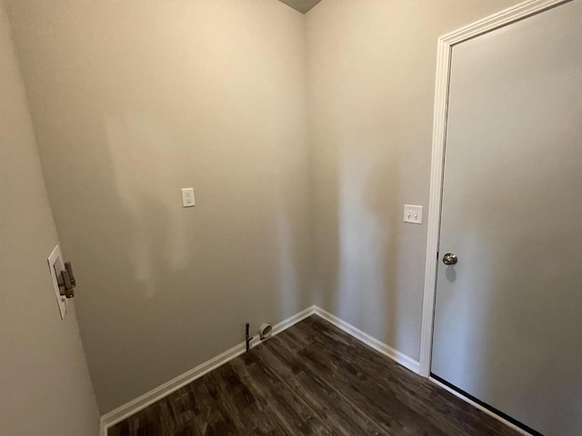 620 E Maple Beach Dr, Edgerton, WI 53534 - washroom with dark wood-type flooring and baseboards