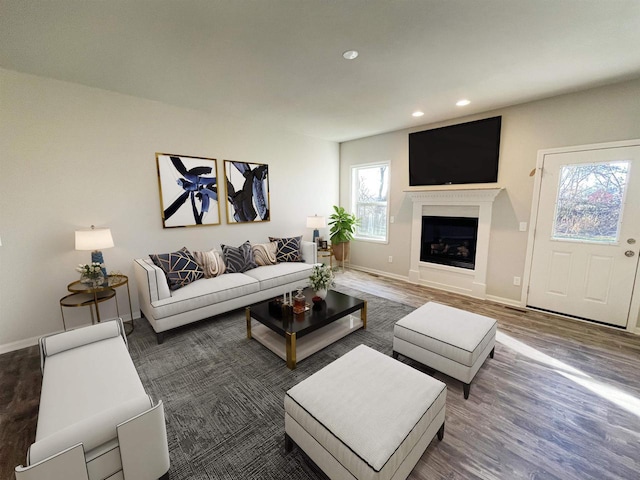 620 E Maple Beach Dr, Edgerton, WI 53534 - living room with recessed lighting, a fireplace, wood finished floors, and baseboards