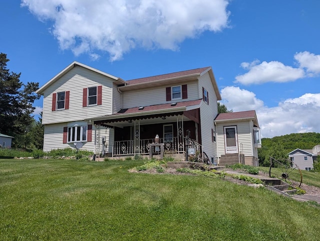 4884 Brewery Rd, Cross Plains, WI 53528 - back of house with a yard and a porch