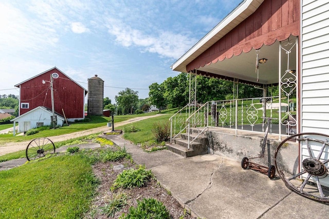 4884 Brewery Rd, Cross Plains, WI 53528 - view of green lawn featuring a barn and an outbuilding