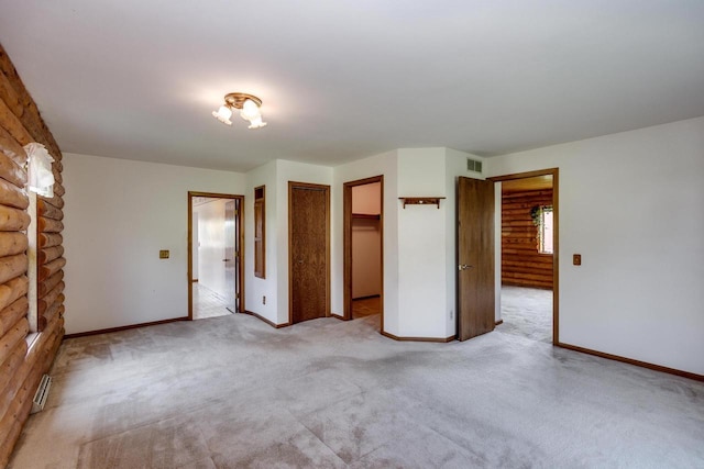 4884 Brewery Rd, Cross Plains, WI 53528 - unfurnished bedroom featuring light colored carpet and baseboards
