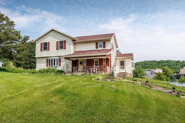 4884 Brewery Rd, Cross Plains, WI 53528 - view of front of property with a porch and a front lawn
