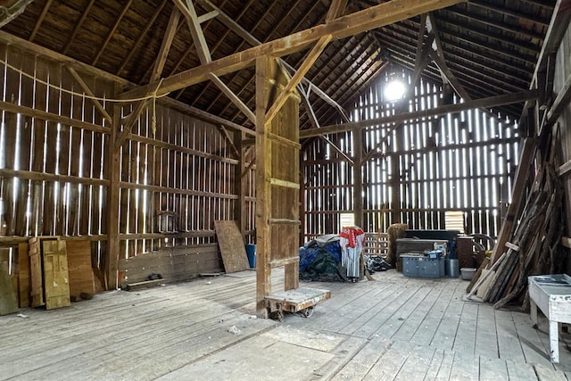 4884 Brewery Rd, Cross Plains, WI 53528 - miscellaneous room featuring vaulted ceiling and wood-type flooring