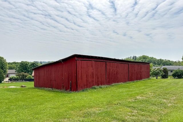 4884 Brewery Rd, Cross Plains, WI 53528 - view of pole building featuring a lawn
