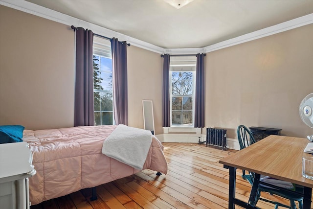 1105 N 6th St, Sheboygan, WI 53081 - bedroom featuring wood-type flooring and multiple windows