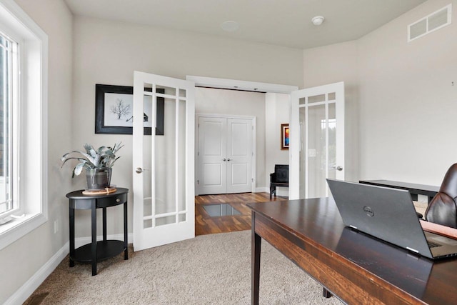 3403 Whistling Wind Way, Sun Prairie, WI 53590 - home office featuring french doors and wood finished floors