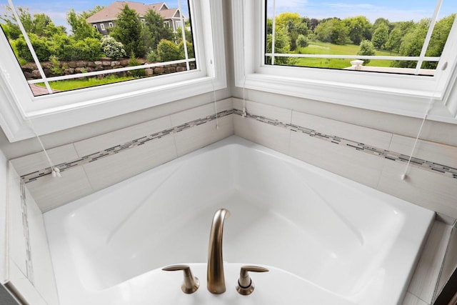 3403 Whistling Wind Way, Sun Prairie, WI 53590 - bathroom with plenty of natural light and a tub to relax in