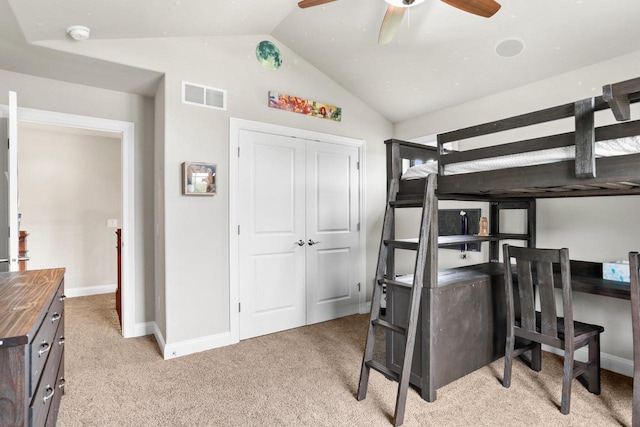 3403 Whistling Wind Way, Sun Prairie, WI 53590 - bedroom with light carpet, vaulted ceiling, a ceiling fan, and a closet