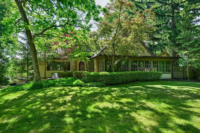 933 Juneau Dr, Fontana, WI 53125 - back of house featuring a lawn