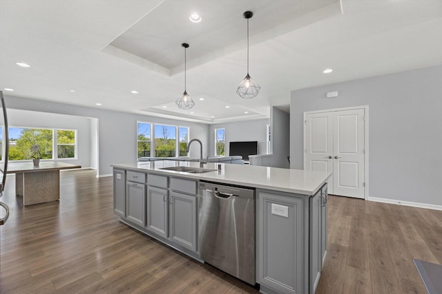 1279 E Hickory Creek Ct, Oak Creek, WI 53154 - kitchen with dishwasher, gray cabinetry, open floor plan, a tray ceiling, and recessed lighting