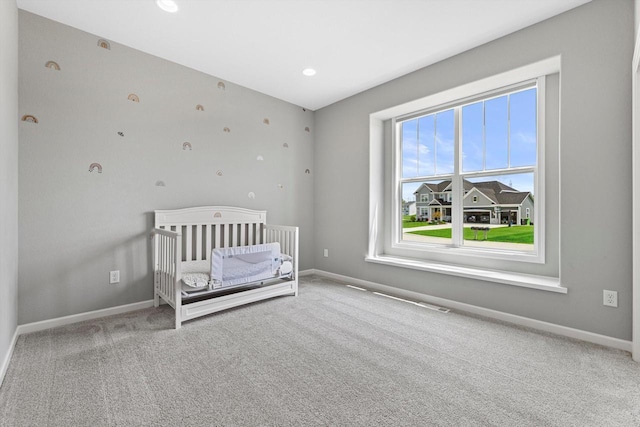 1279 E Hickory Creek Ct, Oak Creek, WI 53154 - carpeted bedroom with baseboards, a nursery area, and recessed lighting