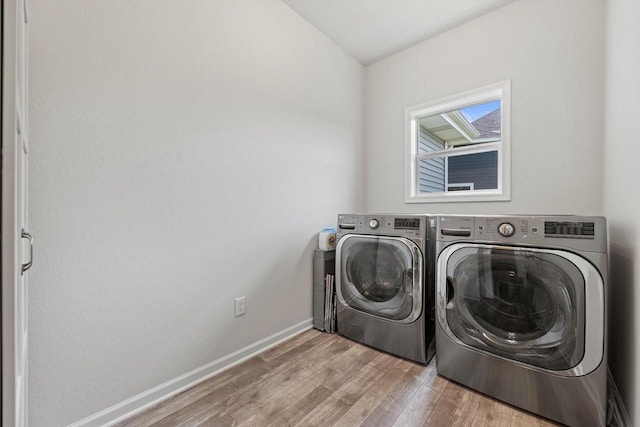 1279 E Hickory Creek Ct, Oak Creek, WI 53154 - laundry room with separate washer and dryer, wood finished floors, and baseboards