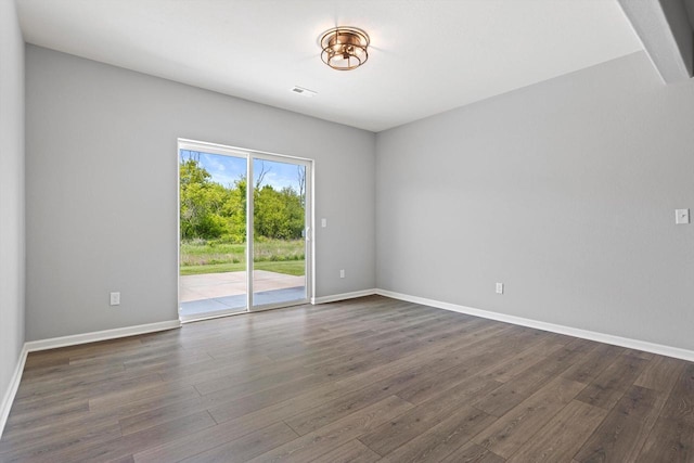 1279 E Hickory Creek Ct, Oak Creek, WI 53154 - unfurnished room with dark wood finished floors and baseboards
