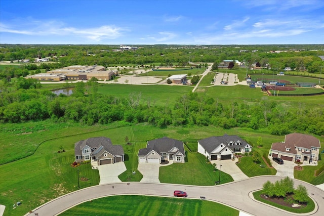 1279 E Hickory Creek Ct, Oak Creek, WI 53154 - aerial perspective of suburban area with a nearby body of water and a tree filled landscape