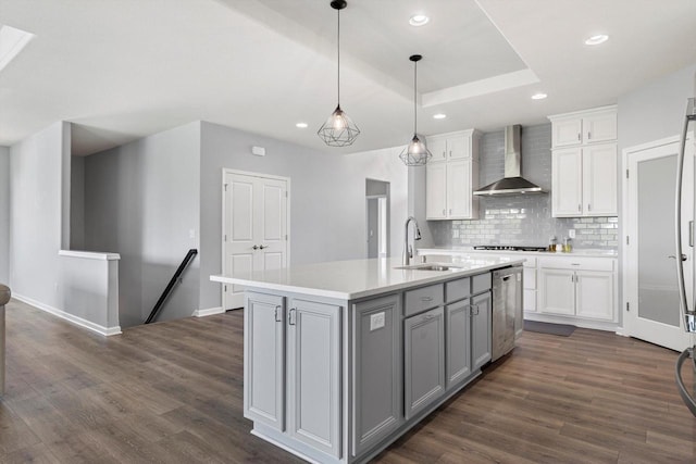 1279 E Hickory Creek Ct, Oak Creek, WI 53154 - kitchen with wall chimney range hood, gray cabinets, a sink, dark wood-style flooring, and dishwasher